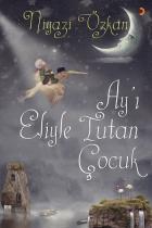 Ayı Eliyle Tutan Çocuk